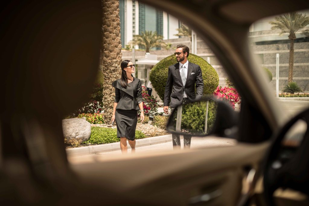 car window view of businesswoman and man walking o 2025 04 05 10 23 53 utc 11zon